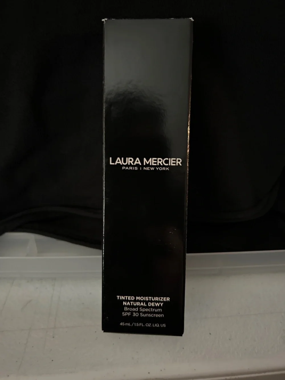 laura mercier Black Packaging Tinted Moisturizer Box